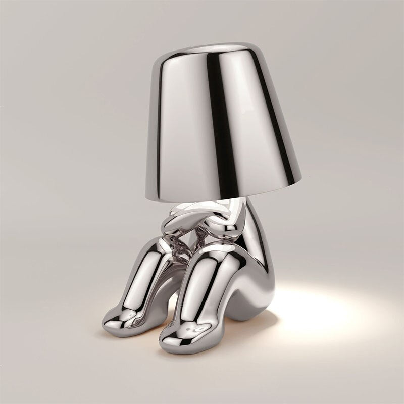 Luvo | Golden Table Lamp in Sculpture Shape – Sitting Design