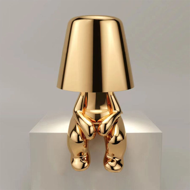 Luvo | Golden Table Lamp in Sculpture Shape – Sitting Design