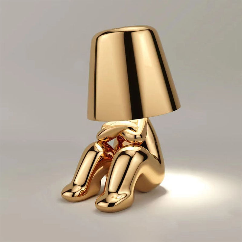 Luvo | Golden Table Lamp in Sculpture Shape – Sitting Design