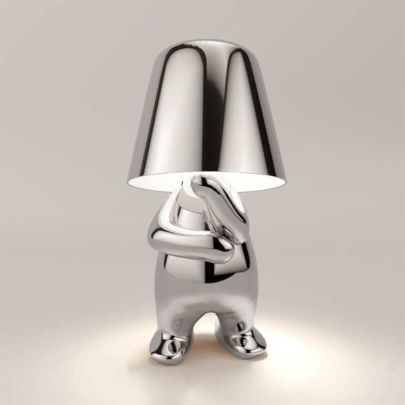 Luvo | Golden Table Lamp in Sculpture Shape – Sitting Design