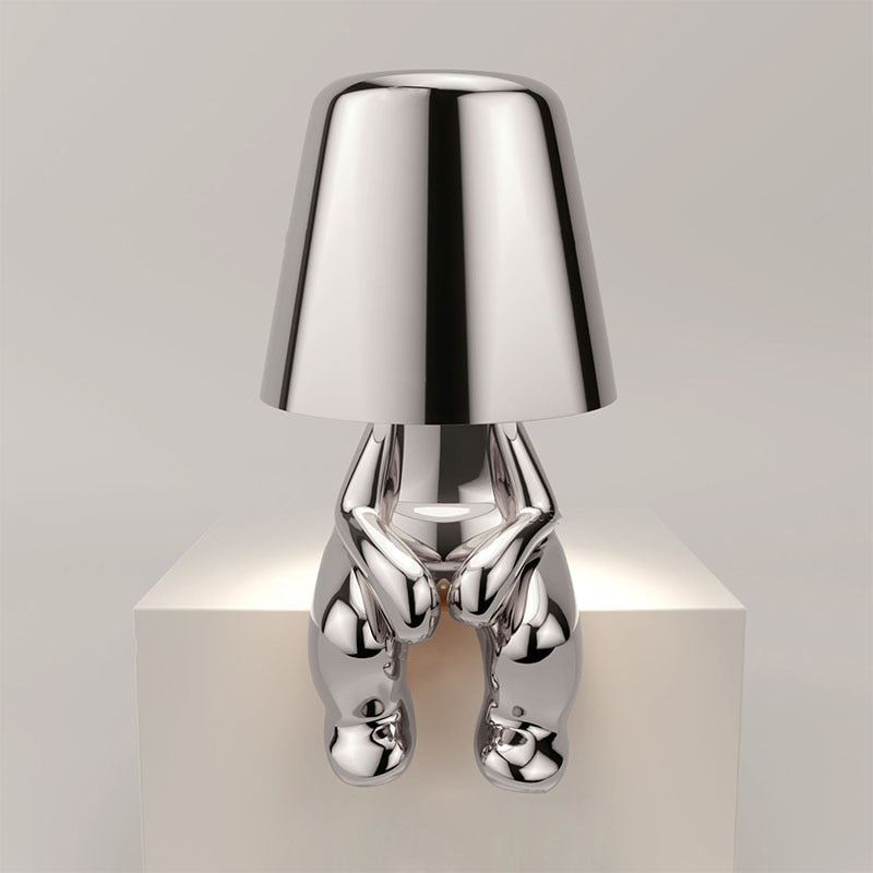 Luvo | Golden Table Lamp in Sculpture Shape – Sitting Design