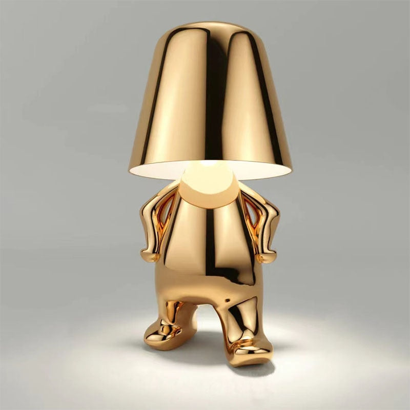 Luvo | Golden Table Lamp in Sculpture Shape – Sitting Design