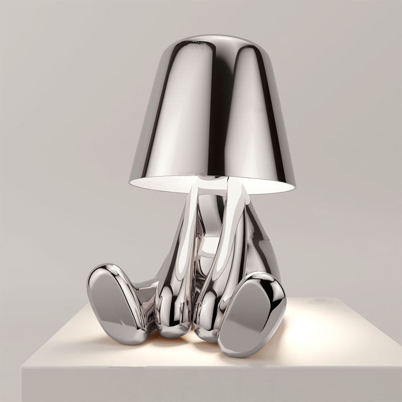 Luvo | Golden Table Lamp in Sculpture Shape – Sitting Design