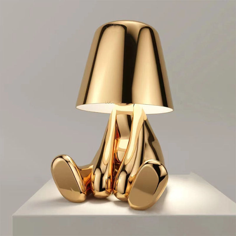 Luvo | Golden Table Lamp in Sculpture Shape – Sitting Design